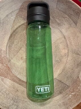Yeti Translucent Green Water Bottle with Black Carry Lid